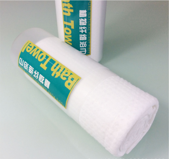 Disposable bath towel in tube